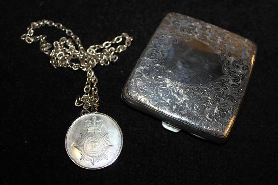 Silver cigarette case and a silver medallion